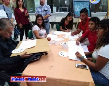 Joel Ramos en el Dia Munidal Pintor Boca y Pie